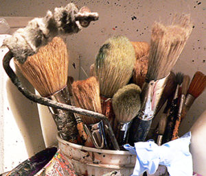 Picture of bucket full of paintbrushes