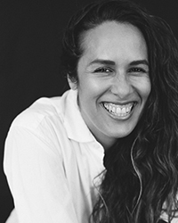 Headshot of Michelle J Rodriguez